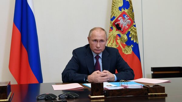 Президент РФ Владимир Путин во время встречи в режиме видеоконференции с Артемом Здуновым