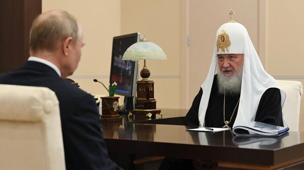 Президент РФ Владимир Путин и патриарх Московский и всея Руси Кирилл во время встречи