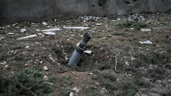 Фрагмент от снаряда системы залпового огня Град в населенном пункте Мартуни в Нагорном Карабахе