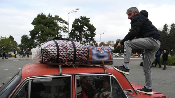 Беженцы, вернувшиеся домой в Степанакерт