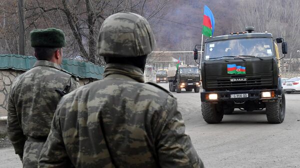 Колонна с азербайджанскими военными в Кельбаджарском районе у населенного пункта Тоганалы