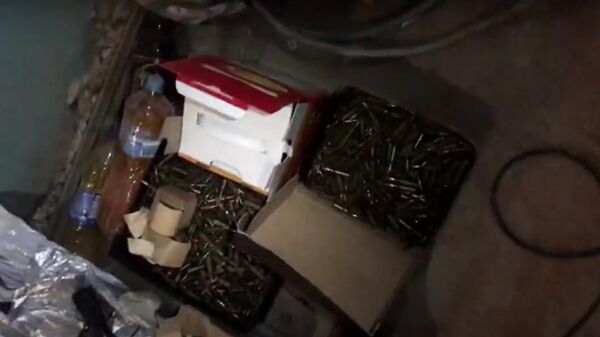 Тайник с боеприпасами, обнаруженный в Печерском районе Киева. Кадр видео