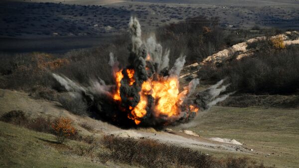 Подрыв боеприпасов, найденных во время разминирования местности в районах Нагорного Карабаха специалистами Международного противоминного центра Министерства обороны РФ