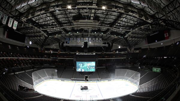 DALLAS, TEXAS - MARCH 07: Empty stands before fans enter the arena for a game between the Nashville Predators and the Dallas Stars at American Airlines Center on March 07, 2020 in Dallas, Texas.   Ronald Martinez/Getty Images/AFP