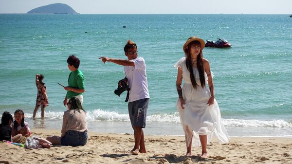 Туристы на острове Хайнань, КНР