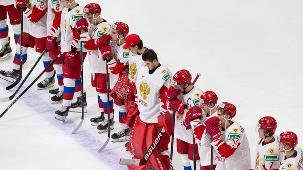 EDMONTON, AB - JANUARY 04: Team Russia reacts after losing to Canada during the 2021 IIHF World Junior Championship semifinals at Rogers Place on January 4, 2021 in Edmonton, Canada.   Codie McLachlan/Getty Images/AFP