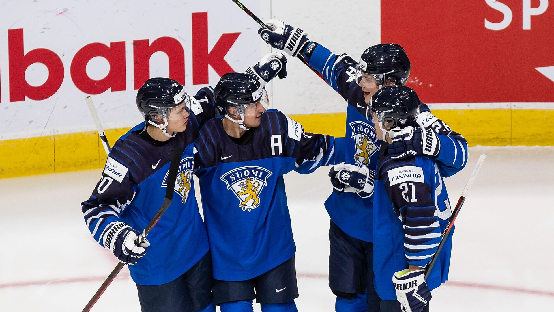 EDMONTON, AB - DECEMBER 25: Kasper Puutio #10, Mikko Kokkonen #35, Henri Nikkanen #28 and Mikael Pyyhtia #21 of Finland celebrate a goal against Germany during the 2021 IIHF World Junior Championship at Rogers Place on December 25, 2020 in Edmonton, Canada.   Codie McLachlan/Getty Images/AFP - РИА Новости, 1920, 05.01.2021