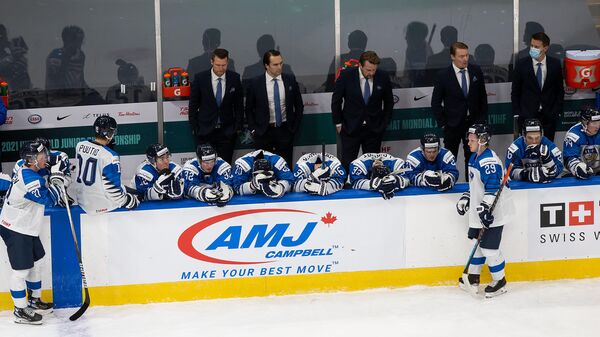 EDMONTON, AB - JANUARY 04: Team Finland reacts to its loss against the United States during the 2021 IIHF World Junior Championship semifinals at Rogers Place on January 4, 2021 in Edmonton, Canada.   Codie McLachlan/Getty Images/AFP