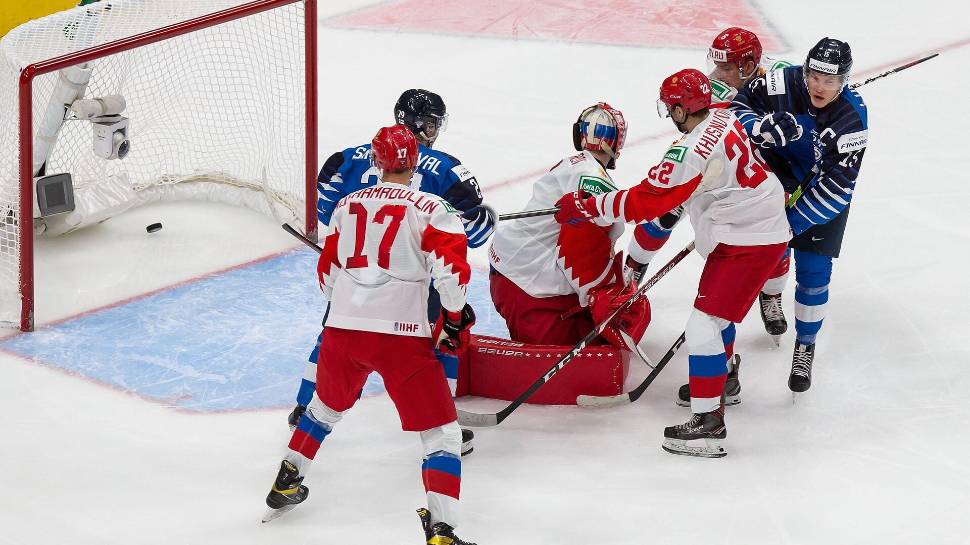 EDMONTON, AB - JANUARY 05: Goaltender Yaroslav Askarov #1 of Russia reacts as Kasper Simontaival #29 and Anton Lundell #15 of Finland attack the net during the 2021 IIHF World Junior Championship bronze medal game at Rogers Place on January 5, 2021 in Edmonton, Canada.   Codie McLachlan/Getty Images/AFP - РИА Новости, 1920, 06.01.2021