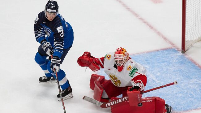 EDMONTON, AB - JANUARY 05: Goaltender Yaroslav Askarov #1 of Russia skates against Henri Nikkanen #28 of Finland during the 2021 IIHF World Junior Championship bronze medal game at Rogers Place on January 5, 2021 in Edmonton, Canada.   Codie McLachlan/Getty Images/AFP