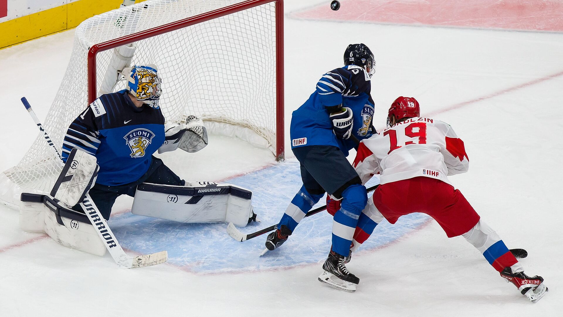 EDMONTON, AB - JANUARY 05: Vasili Podkolzin #19 of Russia skates against goaltender Kari Piiroinen #1 and Eemil Viro #6 of Finland during the 2021 IIHF World Junior Championship bronze medal game at Rogers Place on January 5, 2021 in Edmonton, Canada.   Codie McLachlan/Getty Images/AFP - РИА Новости, 1920, 06.01.2021