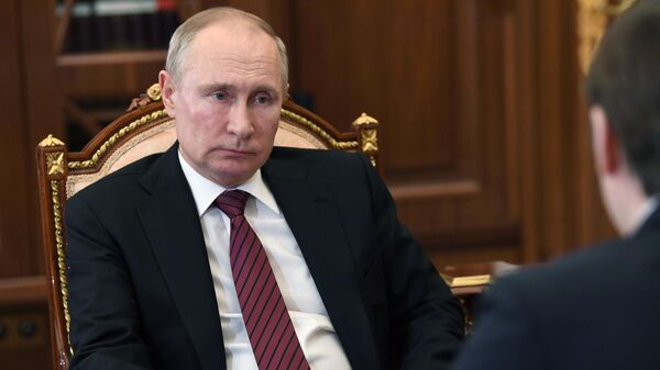Президент РФ Владимир Путин во время встречи с министром просвещения РФ Сергеем Кравцовым