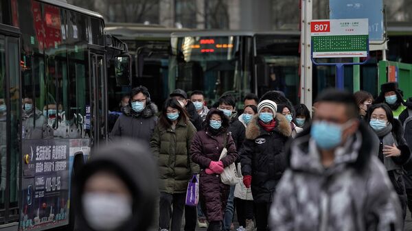 Люди в медицинских масках в Пекине 