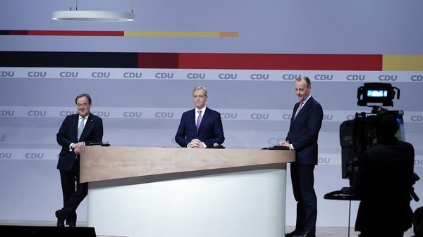Кандидаты на пост председателя партии Армин Лашет, Норберт Рёттген и Фридрих Мерц на партийном съезде ХДС в Берлине, Германия