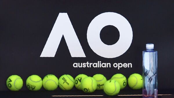 Official tennis balls for the Australian Open are seen on a chair during a practice session ahead of the Australian Open tennis tournament in Melbourne on January 14, 2018. (Photo by PAUL CROCK / AFP) / -- IMAGE RESTRICTED TO EDITORIAL USE - STRICTLY NO COMMERCIAL USE --