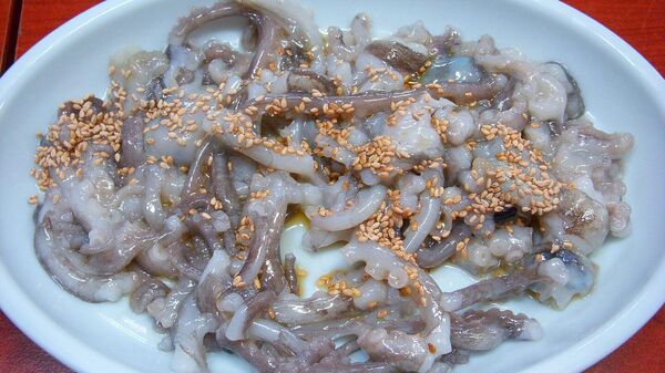Блюдо из живого осьминога Саннакчи