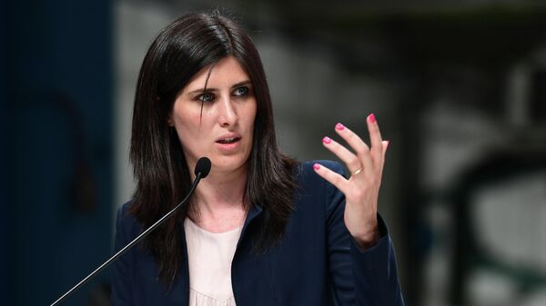 Turin mayor Chiara Appendino delivers a speech during the inauguration of new robots manufactured by Comau  on the assembly line of the Fiat 500 BEV Battery Electric Vehicle, the first of its kind in Europe, at the Mirafiori plant in Turin on July 11, 2019. (Photo by Miguel MEDINA / AFP)