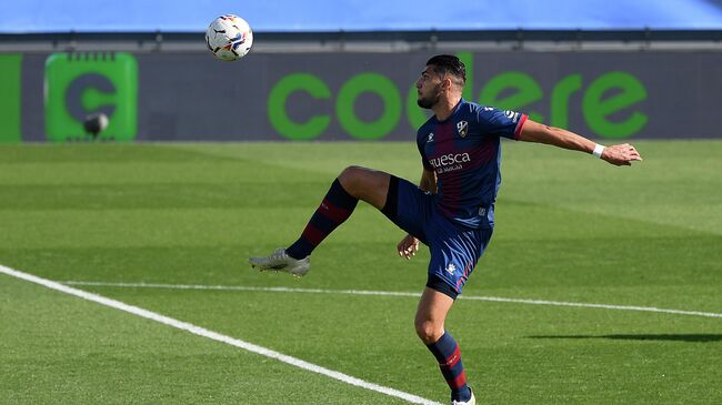 Huesca's Spanish forward Rafa Mir controls the ball during the Spanish League football match between Real Madrid and SD Huesca at the Alfredo Di Stefano stadium in Valdebebas, northeastern Madrid, on October 31, 2020. (Photo by OSCAR DEL POZO / AFP)