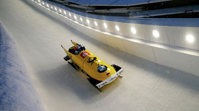 LAKE PLACID, NEW YORK - FEBRUARY 15: Francesco Friedrich and Thorsten Margis of Germany compete in the second run of the two-man bobsled race on day 1 of the 2019 IBSF World Cup Bobsled & Skeleton at the Mount Van Hoevenberg Olympic Bobsled Run on February 15, 2019 in Lake Placid, New York.   Maddie Meyer/Getty Images/AFP