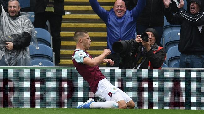 Burnley's Icelandic midfielder Johann Berg Gudmundsson celebrates scoring their third goal during the English Premier League football match between Burnley and Southampton at Turf Moor in Burnley, north west England on August 10, 2019. (Photo by Oli SCARFF / AFP) / RESTRICTED TO EDITORIAL USE. No use with unauthorized audio, video, data, fixture lists, club/league logos or 'live' services. Online in-match use limited to 120 images. An additional 40 images may be used in extra time. No video emulation. Social media in-match use limited to 120 images. An additional 40 images may be used in extra time. No use in betting publications, games or single club/league/player publications. / 