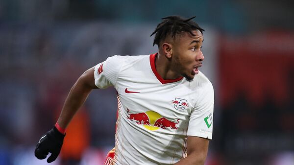 Leipzig's French midfielder Christopher Nkunku controls the ball during the German first division Bundesliga football match between RB Leipzig and Bayer 04 Leverkusen in Leipzig, eastern Germany, on January 30, 2021. (Photo by Ronny HARTMANN / AFP) / DFL REGULATIONS PROHIBIT ANY USE OF PHOTOGRAPHS AS IMAGE SEQUENCES AND/OR QUASI-VIDEO