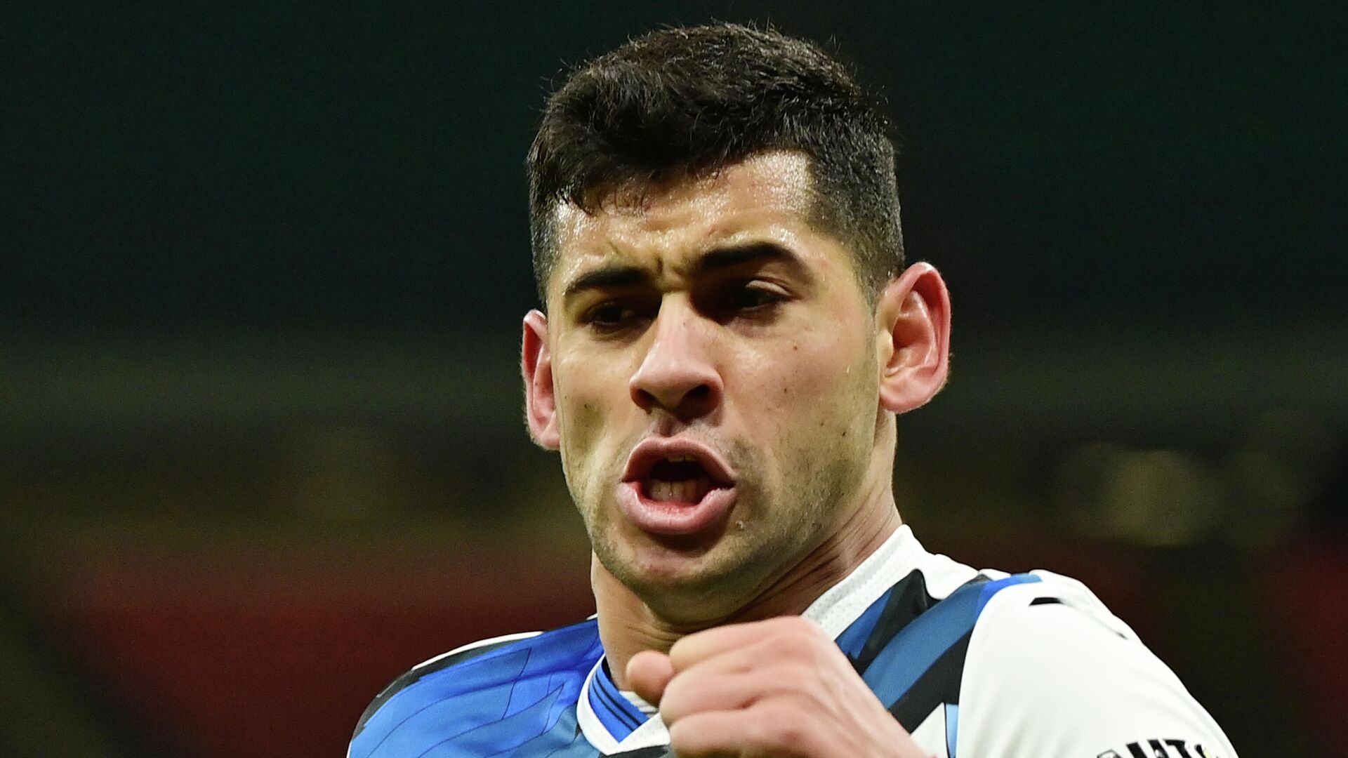 Atalanta's Argentine defender Cristian Romero celebrates after opening the scoring during the Italian Serie A football match AC Milan vs Atalanta Bergamo on January 23, 2021 at the San Siro stadium in Milan. (Photo by MIGUEL MEDINA / AFP) - РИА Новости, 1920, 31.01.2021