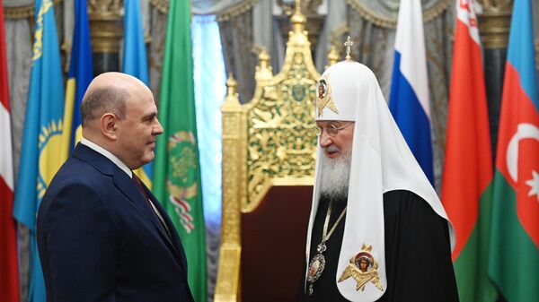 Председатель правительства РФ Михаил Мишустин и патриарх Московского и всея Руси Кирилл во время встречи