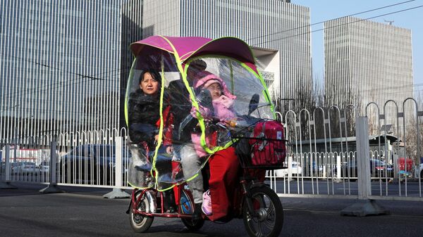Такси-мопед на улице Пекина