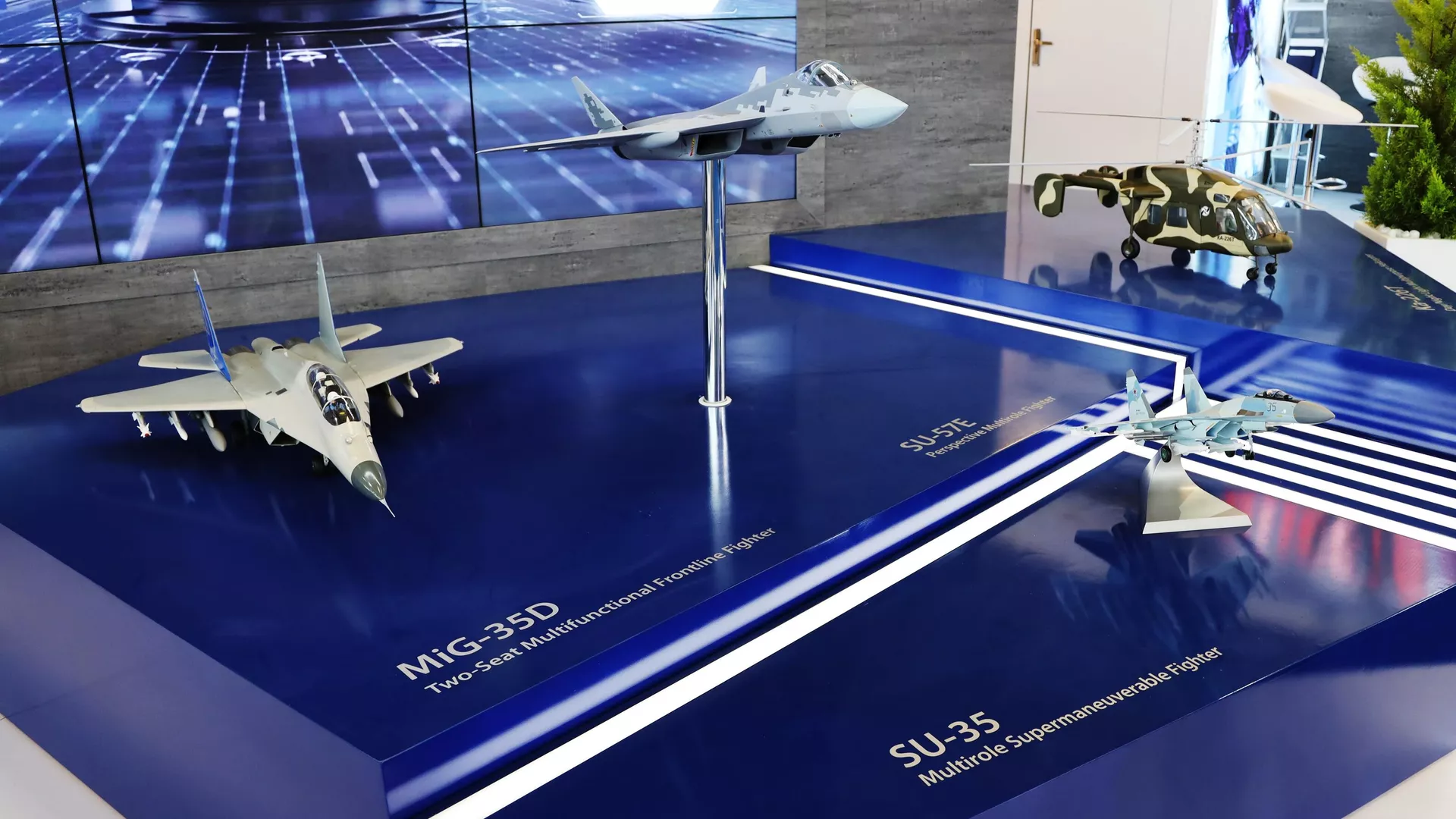 Models of aircraft, MiG-35D, Su-57E and Su-35 at the stand of Rosoboronexport at the international exhibition Aero India 2021