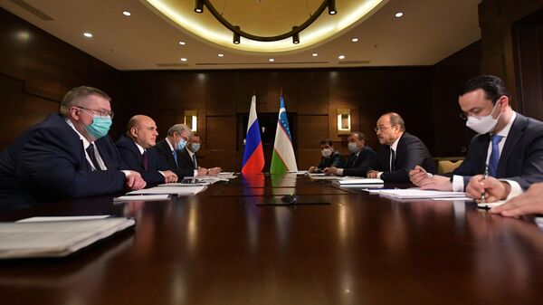 Председатель правительства РФ Михаил Мишустин и премьер-министр Узбекистана Абдулла Арипов во время переговоров в Алматы