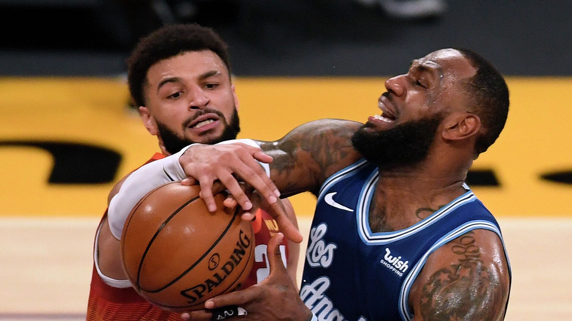 LOS ANGELES, CALIFORNIA - FEBRUARY 04: LeBron James #23 of the Los Angeles Lakers reacts as Jamal Murray #27 of the Denver Nuggets reaches in for the ball during the first half at Staples Center on February 04, 2021 in Los Angeles, California. NOTE TO USER: User expressly acknowledges and agrees that, by downloading and/or using this Photograph, user is consenting to the terms and conditions of the Getty Images License Agreement. Mandatory Copyright Notice: Copyright 2021 NBAE.   Harry How/Getty Images/AFP - РИА Новости, 1920, 05.02.2021