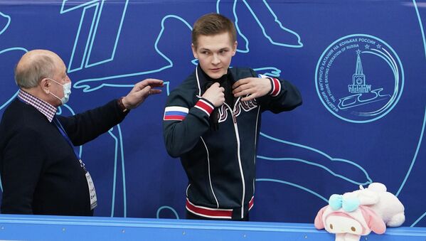 Михаил Коляда и тренер Алексей Мишин