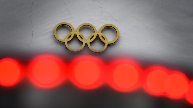 The Olympic Rings are seen at the headquarters of the International Olympic Committee (IOC) in Lausanne on February 3, 2021. (Photo by Fabrice COFFRINI / AFP)