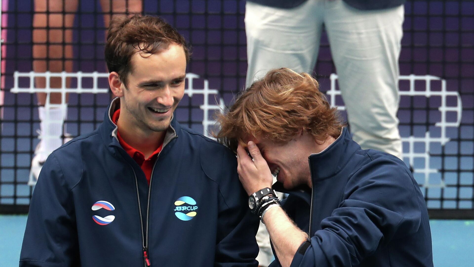 Tennis - ATP Cup - Melbourne Park, Melbourne, Australia, February 7, 2021 Russia's Daniil Medvedev and Andrey Rublev react after winning the ATP Cup in their final against Italy REUTERS/Asanka Brendon Ratnayake - РИА Новости, 1920, 07.02.2021