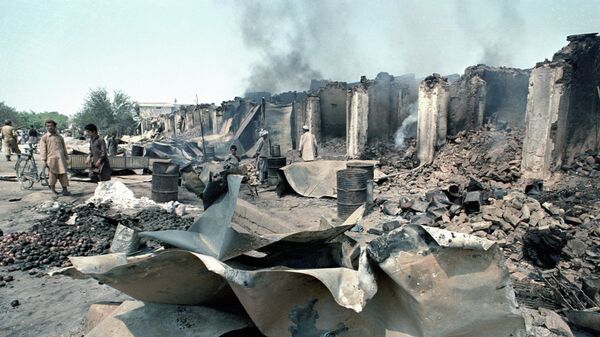 Разрушенные вооруженными отрядами оппозиции лавки афганских духанщиков. Республика Афганистан  