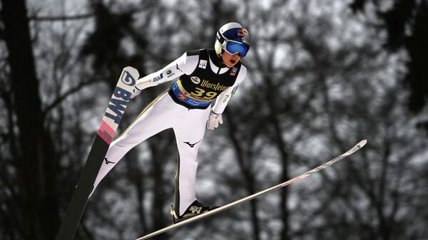 Japan's Ryoyu Kobayashi soars through the air during his first competition jump of the FIS Men's Ski Jumping World Cup in Willingen, western Germany, on January 30, 2021. (Photo by Ina FASSBENDER / AFP)