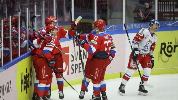 Ice Hockey - Beijer Hockey Games - Russia v Czech Republic - Malmo Arena, Malmo, Sweden - February 14, 2021 Russia's Nikolai Kovalenko celebrates scoring with teammates TT News Agency via REUTERS/Andreas Hillergren/tt THIS IMAGE HAS BEEN SUPPLIED BY A THIRD PARTY. IT IS DISTRIBUTED, EXACTLY AS RECEIVED BY REUTERS, AS A SERVICE TO CLIENTS. SWEDEN OUT. NO COMMERCIAL OR EDITORIAL SALES IN SWEDEN..