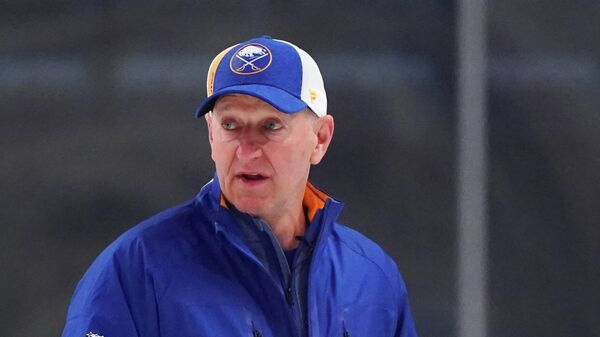 BUFFALO, NY - JANUARY 1: Buffalo Sabres head coach Ralph Krueger watching play on ice during training camp at KeyBank Center on January 1, 2021 in Buffalo, New York.   Kevin Hoffman/Getty Images/AFP