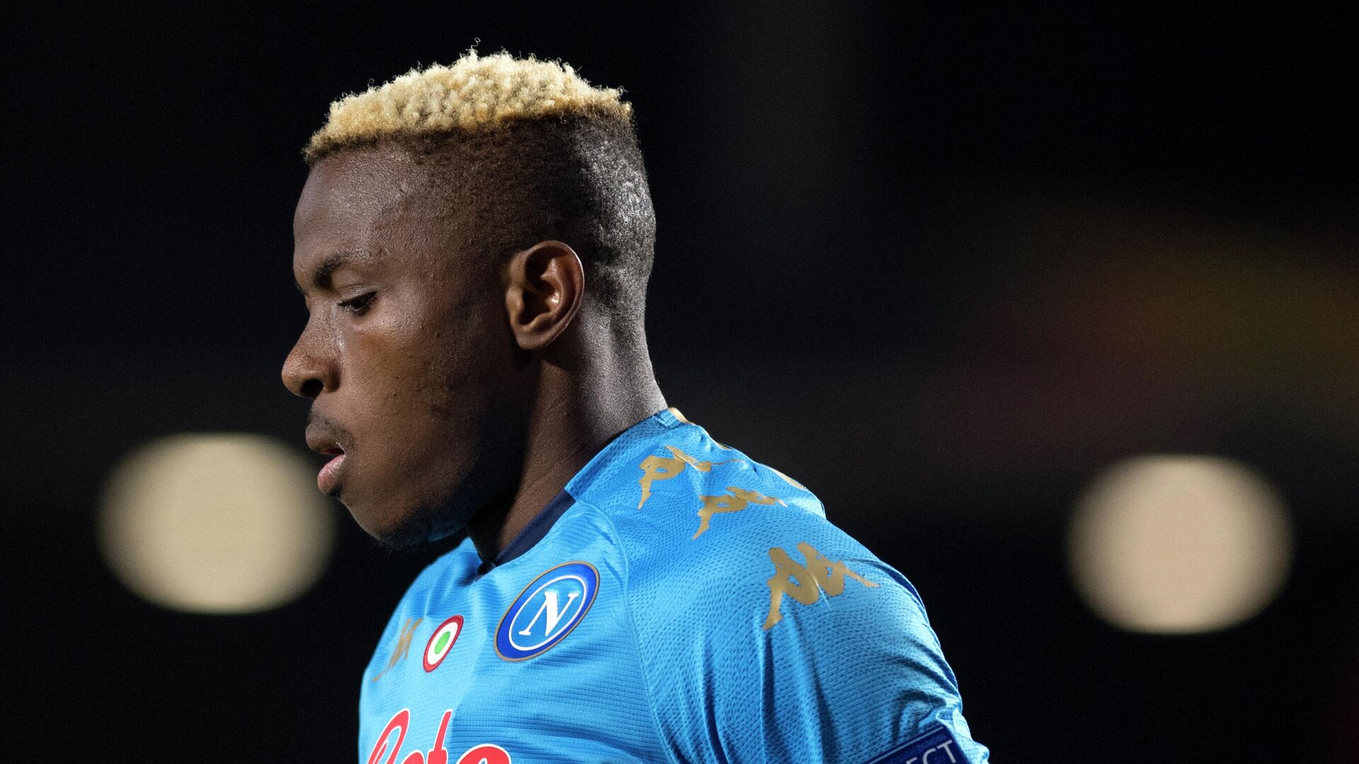 Napoli's Nigerian forward Victor Osimhen reacts during the UEFA Europa League round of 32 first leg football match between Granada FC and Napoli at Nuevo Los Carmenes stadium in Granada on February 18, 2021. (Photo by JORGE GUERRERO / AFP) - РИА Новости, 1920, 22.02.2021