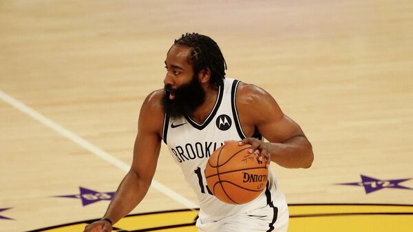 LOS ANGELES, CALIFORNIA - FEBRUARY 18: James Harden #13 of the Brooklyn Nets handles the ball during the third quarter against the Los Angeles Lakers at Staples Center on February 18, 2021 in Los Angeles, California. NOTE TO USER: User expressly acknowledges and agrees that, by downloading and or using this photograph, User is consenting to the terms and conditions of the Getty Images License Agreement.   Katelyn Mulcahy/Getty Images/AFP (Photo by Katelyn Mulcahy / GETTY IMAGES NORTH AMERICA / AFP)