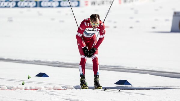 Сергей Устюгов на финише спринта свободным стилем в финале соревнований по лыжным гонкам среди мужчин на чемпионате мира-2021 по лыжным видам спорта в немецком Оберстдорфе.