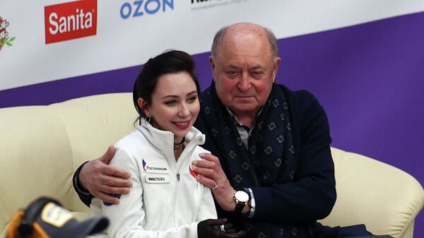 Елизавета Туктамышева с тренером Алексеем Мишиным