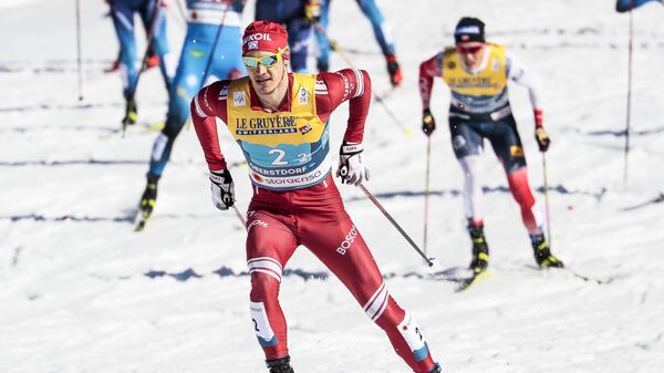 Глеб Ретивых (Россия) на дистанции командного спринта в финале во время соревнований по лыжным гонкам среди мужчин на чемпионате мира-2021 по лыжным видам спорта в немецком Оберстдорфе.