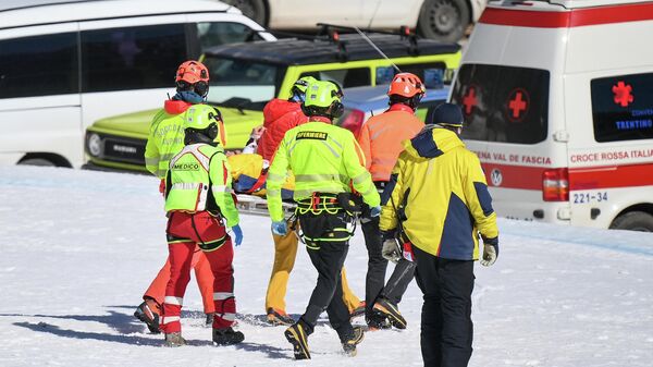 Norway's Kajsa Vickhoff Lie is evacuated by a medical team after her injury during the FIS Alpine Ski Women's World Cup Super G event, in Val di Fassa, northern Italy Alps, on February 28, 2021. (Photo by Marco BERTORELLO / AFP)