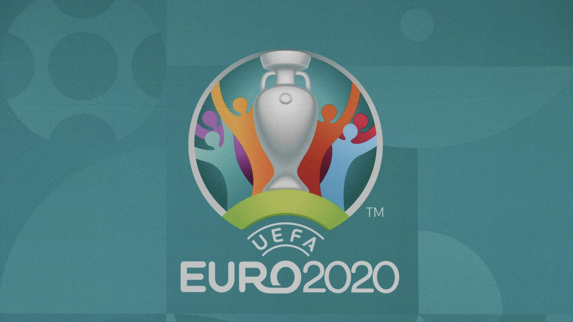 This picture taken on November 30, 2019, in Bucharest, Romania, shows the logo of the European Football Championship 2020 ahead of the UEFA Euro 2020 Final Draw Ceremony. - Bucharest will host the UEFA Euro 2020 draw on November 30, 2019 and host matches in the summer tournament but doubts have arisen on the progress of the construction work. (Photo by Fabrice COFFRINI / AFP) This picture taken on November 30, 2019, in Bucharest, Romania, shows the logo of the European Football Championship 2020 ahead of the UEFA Euro 2020 Final Draw Ceremony. - Bucharest will host the UEFA Euro 2020 draw on November 30, 2019 and host matches in the summer tournament but doubts have arisen on the progress of the construction work. (Photo by Fabrice COFFRINI / AFP) - РИА Новости, 1920, 02.03.2021