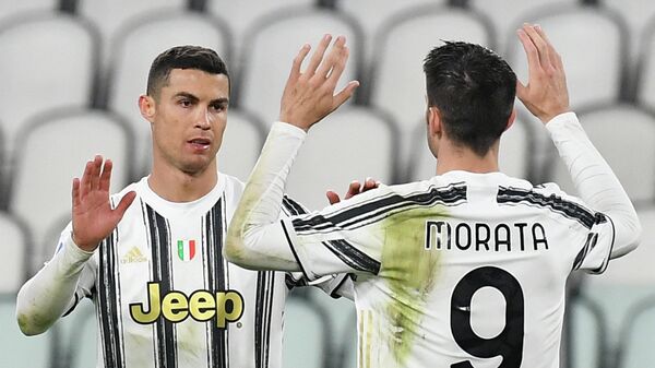 Juventus' Portuguese forward Cristiano Ronaldo celebrates after scoring the third goal during the Italian Serie A football match Juventus vs Spezia on March 02, 2021 at the Juventus stadium in Turin. (Photo by Isabella BONOTTO / AFP)