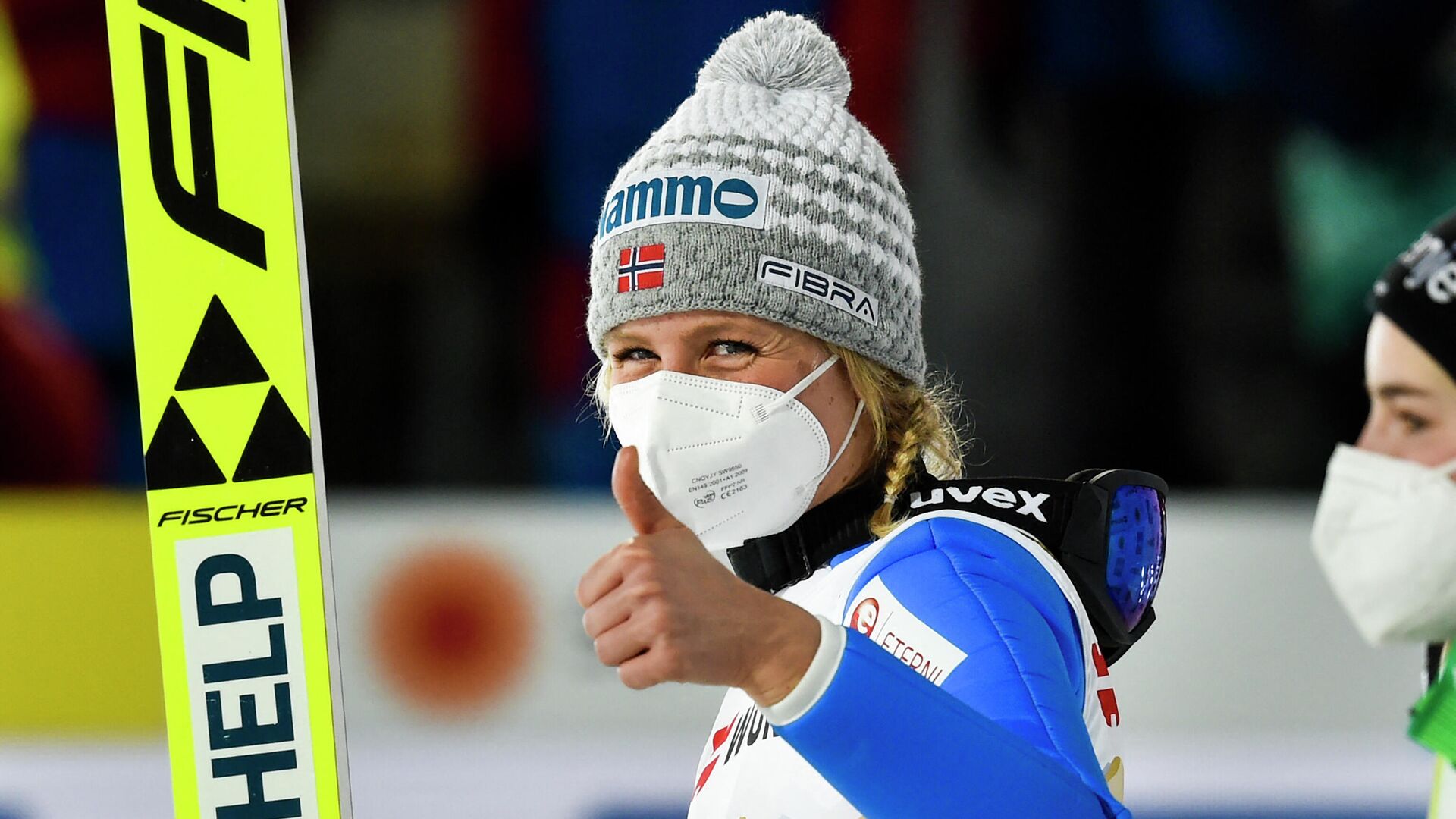 Norway's Maren Lundby give a thumbs up after winning the women's HS137 large hill jumping event at the FIS Nordic Ski World Championships in Oberstdorf, southern Germany, on March 3, 2021. (Photo by Christof Stache / AFP) - РИА Новости, 1920, 03.03.2021