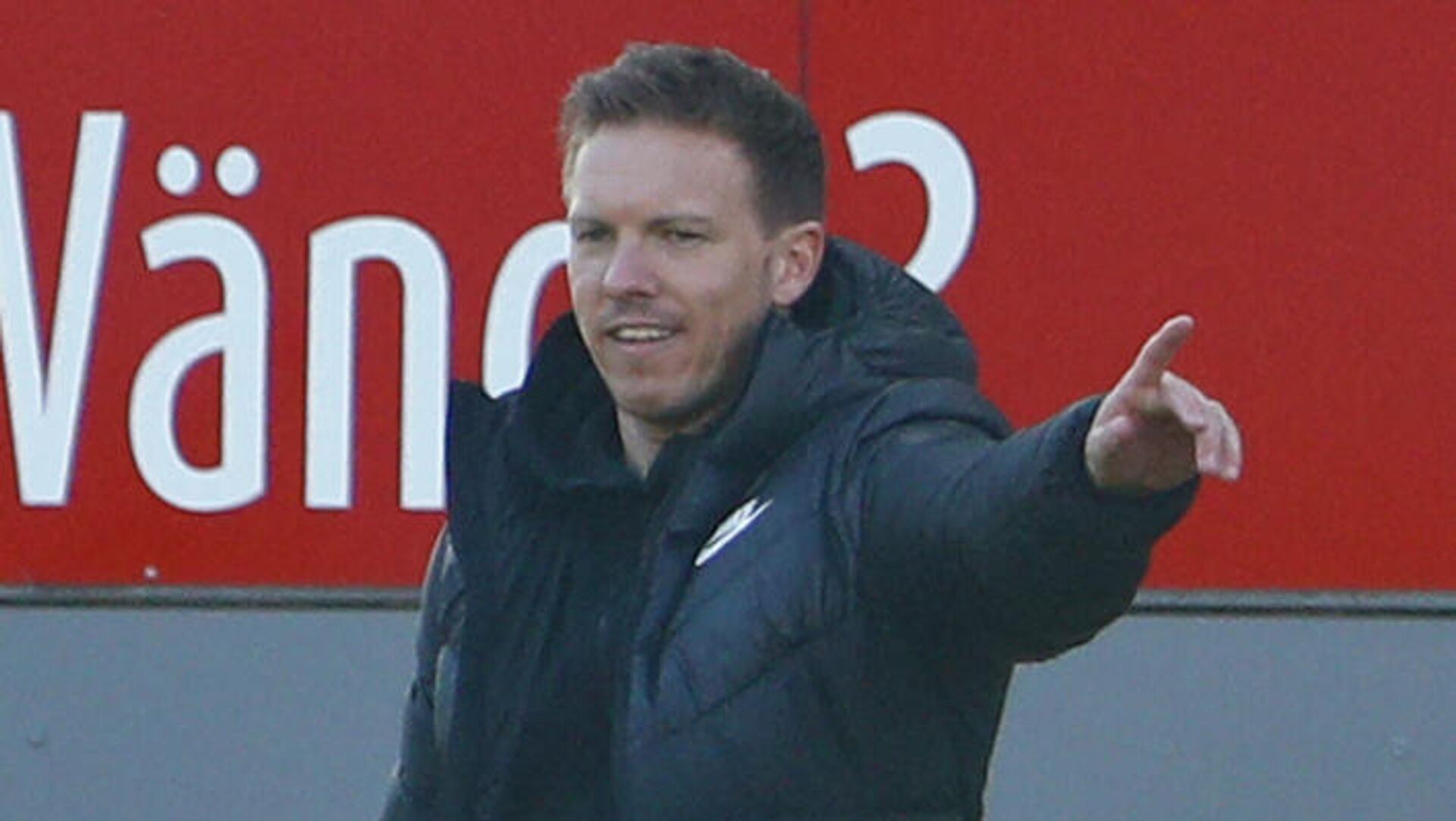 Leipzig's German headcoach Julian Nagelsmann gestures during the German first division Bundesliga football match between SC Freiburg and RB Leipzig in Freiburg, southwestern Germany, on March 6, 2021. (Photo by Ralph ORLOWSKI / POOL / AFP) / DFL REGULATIONS PROHIBIT ANY USE OF PHOTOGRAPHS AS IMAGE SEQUENCES AND/OR QUASI-VIDEO - РИА Новости, 1920, 09.03.2021