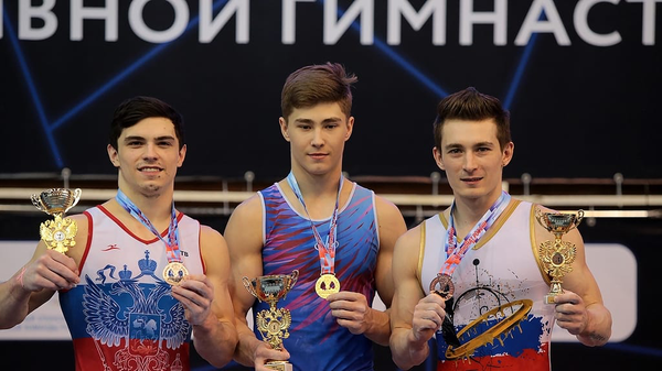 Российские гимнасты Артур Далалоян, Александр Карцев и Давид Белявский (слева направо)