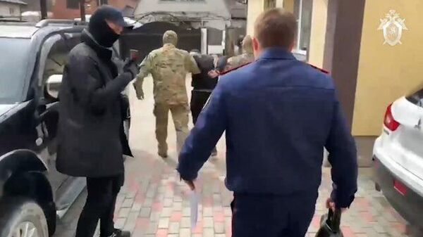 Задержание подозреваемых в организации экстремистского сообщества в Краснодарском крае. Кадры СК